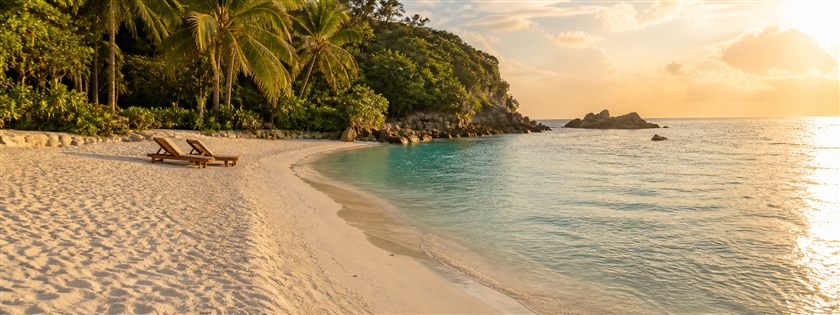 A peaceful tropical beach at golden hour